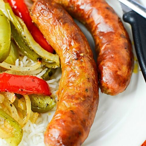 https://www.annsentitledlife.com/wp-content/uploads/2019/12/oven-roasted-spicy-sausage-and-peppers-recipe-vertical-480x480.jpg