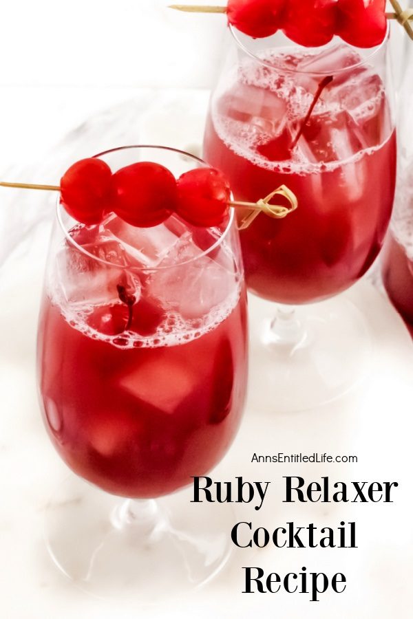 Two glasses ruby relaxer cocktail set on a white tray