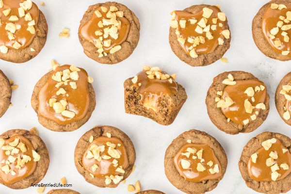 Easy Snickers Stuffed Cookie Cups Recipe. Discover how to make easy Snickers stuffed cookie cups. This simple recipe creates delicious cookie cups filled with your favorite candy bar for a perfect sweet treat.