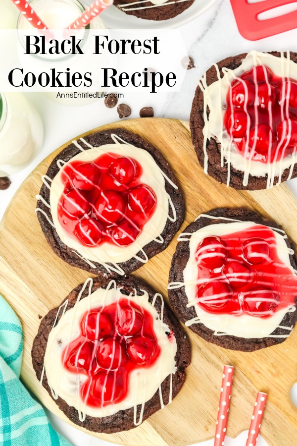 Overhead view of Black forest cookies on wooden board.