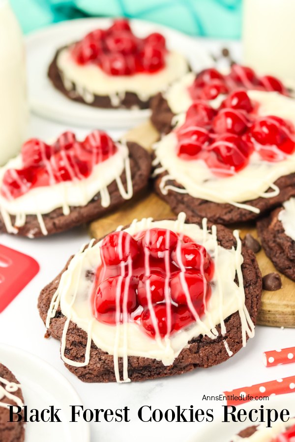 Side view of Black forest cookies on wooden board.