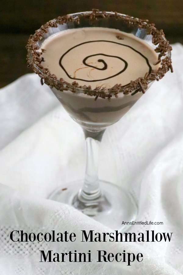 a chocolate marshmallow martini on a white cloth