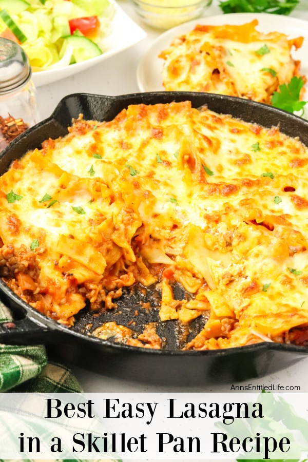 A side view of a pan of skillet lasagna with a serving removed.